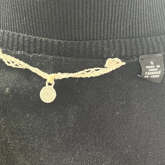 Knitted and Knotted Black Sweater with White Bows - Picture 7 of 8